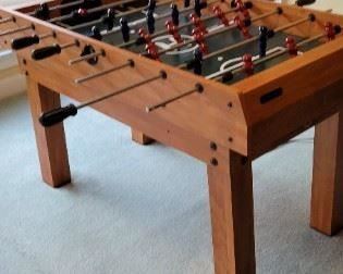 Foosball (multiple game) table including air hockey.