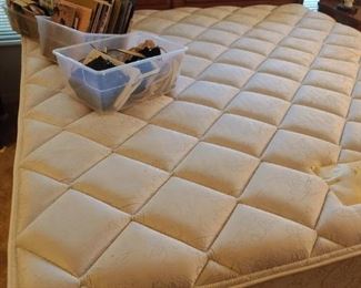 King size bed, books, small purses, ephemera