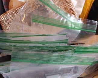 Handkerchiefs, small beaded wallet, thimbles, scarves, etc.