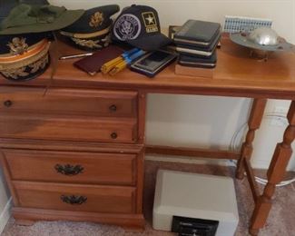 Desk, military hats, small safe