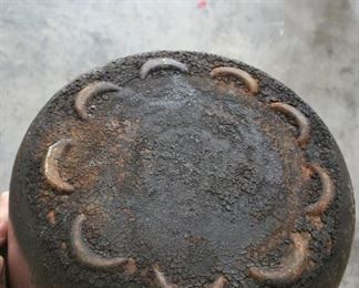 Bottom of iron pot