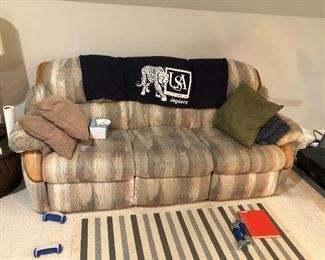 Cloth sofa with reclining ends.