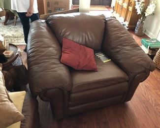   Broyhill very nice condition leather chair with matching ottoman. 