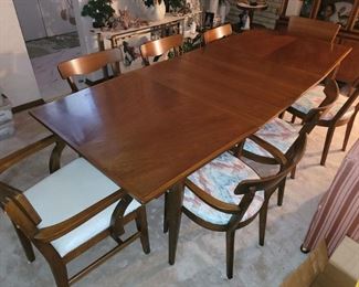 Mid century modern table with eight chairs. (Lane?) 