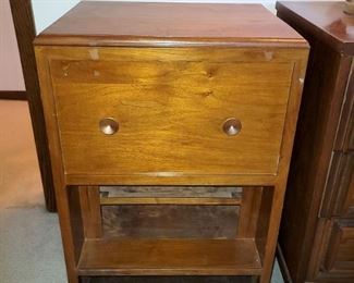Small cabinet that opens at top