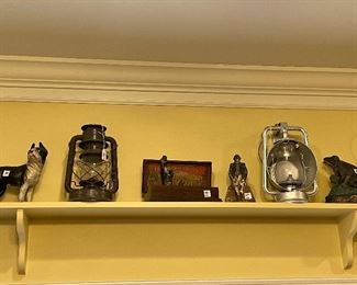 Antique railroad lanterns, antique lanterns, antique iron doorstops, Hubbly and others. All are Antique