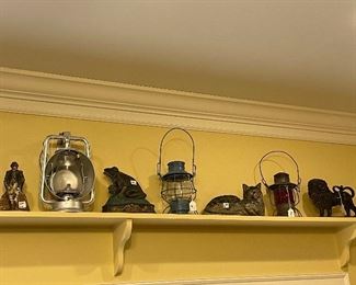 Antique railroad lanterns, antique lanterns, antique iron doorstops, Hubbly and others. All are Antique