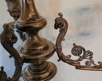 Victorian silverplate candlesticks with rams heads