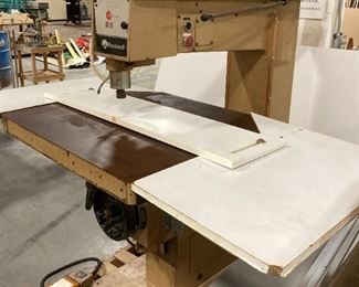 ROCKWELL / SCMI OVERHEAD PIN ROUTER WITH CUSTOM CRAFTED WORKING AREA (the white additions). Was purchased used in late 2019 but never hooked up due to COVID shutdown. Still on a pallet.