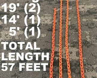STEEL 1/4" CHAIN. TOTAL OF 57 FEET IN LENGTH. IT APPEARS TO BE POWDER COATED.                      ORANGE IS THE COLOR!!!