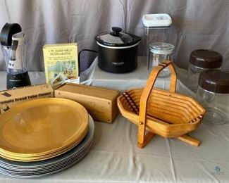 Kitchen Items
Cannisters, small crockpot, Hamilton Beach single serve blender, 4 gold plate chargers, 8 silver plate chargers (plastic), solid wood collapsing fruit basket, cheese grater, Pampered Chef bread tubes (heart and flower)