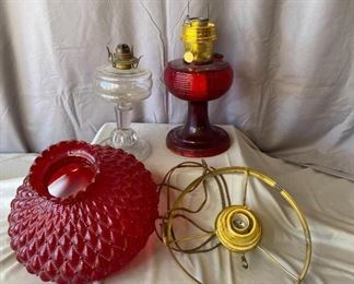 Lanterns
Ruby red lantern with missing globe (chips at base), and red globe that does not match and a clear glass lantern with missing globe, plus an electric bonus part
