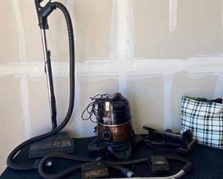 Rainbow Vacuum Cleaner
Rainbow SE cannister vacuum cleaner with parts and accessories