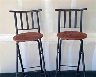 Folding Bar Stools
Pair of metal barstools that fold right out of the way