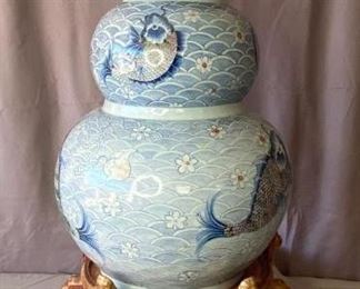 Large Asian Vase
Asian 3 tiered koi ceramic vase, blue and white with wood stand