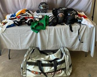 Hockey Equipment
Bauer hockey helmet, leg and knee guards, jerseys, gloves, skates (size 7, PowerLine), puck, gym bag, Bauer chest protector, and more
