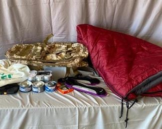 Camping Equipment
REI mummy sleeping bag (polyester fiber), good condition, sterno, candles, camo bag, ankle weights