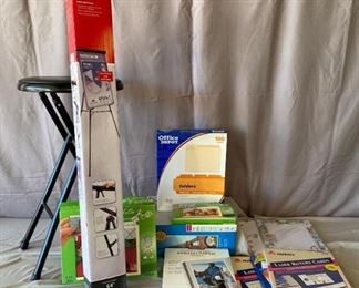 Office Equipment
64" presentation easel, new in box, collapsible stool, and box of paper, photo paper, photo book creator and more