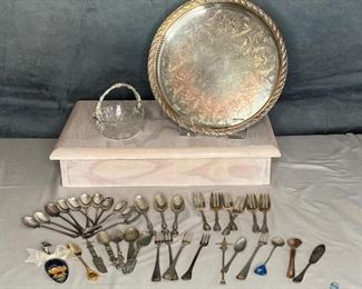 Sterling and Silver Plate
Small forks (3,1 oz), small spoons (1.7 oz), and various forks, spoons, and decorative spoons, and a beautiful spoon painted with a nativity, engraved silver plate round platter and glass and silver colored handle bridal basket