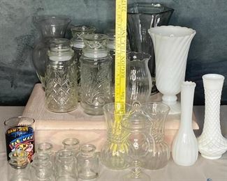 Glass Vases and Jars
4 pretty glass cannisters, large glass vase, 3 smaller vases, some milk glass, 6 glass small vases and a PAC MAN glass