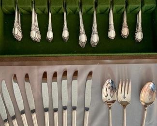 Oneida Silver Plate Flatware
Service for 12, knives, forks, spoons, salad forks, teaspoons in original case. Wm Johnson silver plate