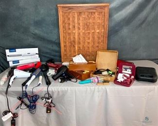Personal Care Items
Curling irons, hair dryers, new brushes, shavers, travel dryer, and more, solid oak hamper, painted wood tissue dispensers