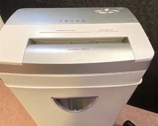 Office Furniture
Rolling desk chair, two desk lamps, paper shredder by Infoguard