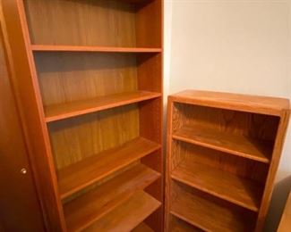 Bookshelves
Smaller oak shelves, taller wood shelves