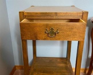 Wood Side Tables
One drawer with brass pull. One round table with bottom shelf.