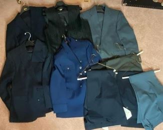 Men's Suits
All jackets come with matching slacks. Black vest size medium, 5 pairs of dress slacks. Not all have sizes listed. Some pants are 36"x30, 38x31, Two pairs of pants are brand new with tags, one suit jacket is 42R. Brands include Haggar and Stafford. Comes with two zippered suit bags.