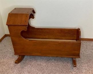 Wood Baby Cradle
Handmade with love! Some scuffs. Has gingham covered foam pad for a mattress.