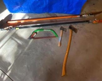 Stihl Tree Trimmer and More
Gas powered Stihl tree trimmer, a hacksaw, and small axe and larger axe, manual tree trimmer by Fiskars