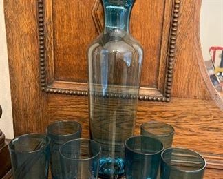 Blue glass decanter and shot glasses