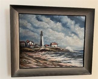 Framed lighthouse painting