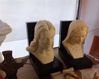 Various Religious figurines, bookends, nativity scenes.