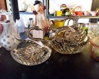 Swan salt cellars and a variety of figurines