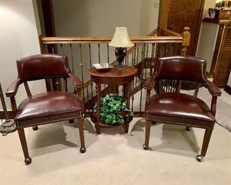 Handsome pair of leather pub chairs