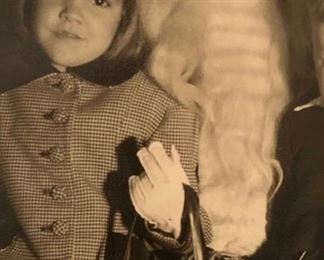 believe in the magic and carry a great purse. Kitty with Santa