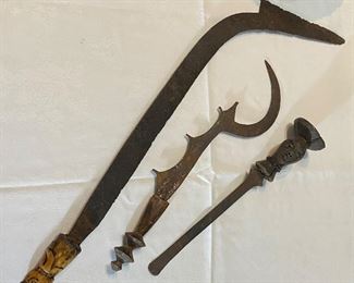 sickle, machete  and  ceremonial scepter