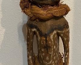 large statue, this guy has go game