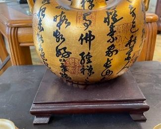 Oriental vase and wood base