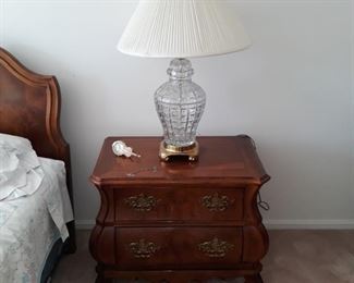 Pair of matching table lamps made of cut crystal/glass and brass. In nice condition. 
Night stands are marked sold