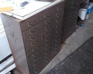 Two additional  multi drawer metal storage cabinets , made by Steelmaster . Thirty drawers  per cabinet