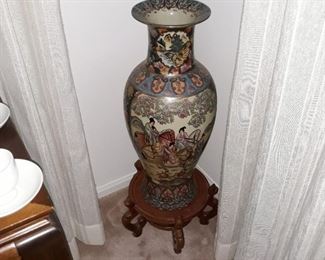 Large decorative vase on stand