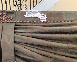 Custom wall floor to ceiling  Drapes with tiebacks.    Must See!