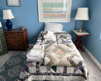 Twin bed with quilts