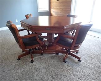 BRUNSWICK GAME TABLE - RE MOVEABLE TOP - 4 CHAIRS ON WHEELS