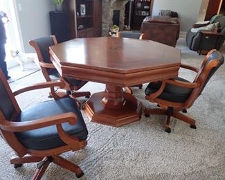 BRUNSWICK GAME TABLE - RE MOVEABLE TOP - 4 CHAIRS ON WHEELS