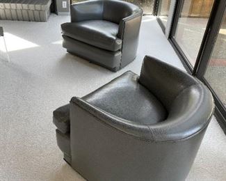 Pr. Of Immaculate grey Leather barrel chairs..
