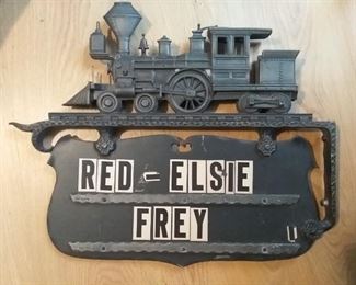 train metal name sign outdoor